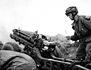 British First Airborne troops using a 75mm gun, Arnhem; Seco British First Airborne troops using a 75mm gun, Arnhem; Seco