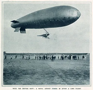 A British naval airship coming in to land after a long flight. Date: 1916 A British naval airship coming in to land after a long flight. Date: 1916