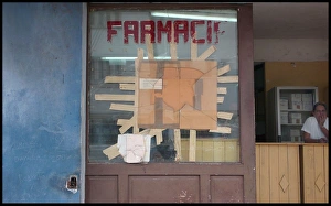 Broken window, chemists shop. Havana, Cuba Broken window, chemists shop. Havana, Cuba