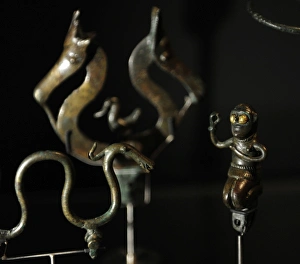 Bronze Age. Several womens ornaments and some bronze figure Bronze Age. Several womens ornaments and some bronze figure