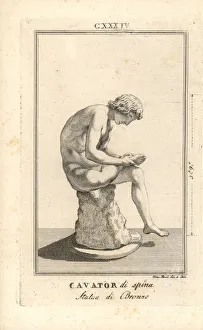 Bronze statue of a young man removing a thorn from his foot Bronze statue of a young man removing a thorn from his foot