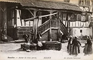 Buswiller, Alsace, France - Ancient Farmstead and well Buswiller, Alsace, France - Ancient Farmstead and well