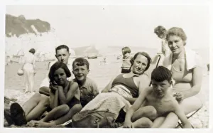 A candid Seaside Family Photograph - White Cliffs and pebble beach at Beer, South Devon A candid Seaside Family Photograph - White Cliffs and pebble beach at Beer, South Devon