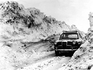 Car in a snowdrift near Crediton, Devon Car in a snowdrift near Crediton, Devon