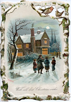 Carol singers in the snow on a cutout Christmas card Carol singers in the snow on a cutout Christmas card