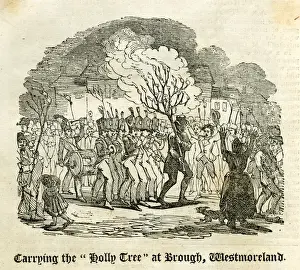 Prints of Carrying the Holly Tree at Brough, Westmorland (now Cumbria). This tradition takes place on Twelfth Night, when a burning holly tree is carried through the village, followed by a brass band. 1827 Westmorland Prints: Carrying the Holly Tree at Brough, Westmorland Print