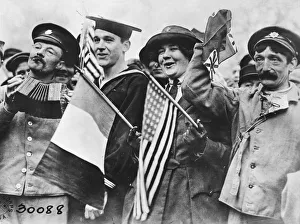 <b class=qtipBold><figcaption>Celebrating victory, 1918</figcaption></b><br>French and American soldiers celebrating victory at the end of the First World War<br><em>© Mary Evans/Robert Hunt Collection/Imperial War Museum</em> Celebrating victory, 1918