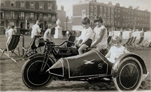 Three children on a 1930 JAP Special motorcycle & sidecar Three children on a 1930 JAP Special motorcycle & sidecar