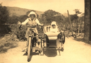 Children in motorcycle and side car Children in motorcycle and side car