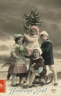 <b class=qtipBold><figcaption>Children Obtain Tree</figcaption></b><br>Four children have found a snow-covered tree and some presents<br><em>© Mary Evans Picture Library</em> Children Obtain Tree