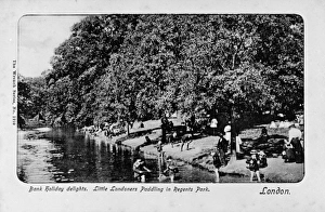 Children paddling in Regents Park, London Children paddling in Regents Park, London