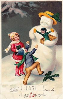 Children with snowman on a German Christmas postcard Children with snowman on a German Christmas postcard