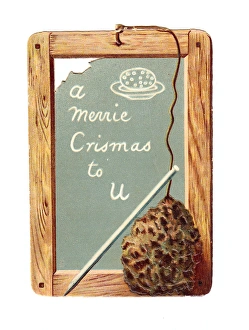 Childs slate with pen and greeting on a Christmas card Childs slate with pen and greeting on a Christmas card