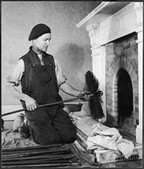 <b class=qtipBold><figcaption>Chimney Sweep & Brush</figcaption></b><br>A chimney sweep kneels on the hearth and prepares to insert his brush up the chimney.<br><em>© Mary Evans Picture Library</em> Chimney Sweep & Brush