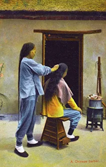 China - A Chinese Barber, preparing a long pigtail China - A Chinese Barber, preparing a long pigtail
