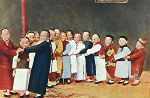 China - School Children playing Oranges and Lemons China - School Children playing Oranges and Lemons