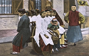Eight Chinese Factory Girls on a wheelbarrow, China Eight Chinese Factory Girls on a wheelbarrow, China