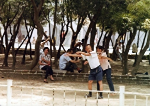 Chinese people shadow boxing in the park in Hong Kong Chinese people shadow boxing in the park in Hong Kong