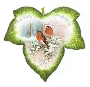 Christmas card in the shape of a green leaf with robins Christmas card in the shape of a green leaf with robins