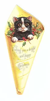 Images Dated 3rd December 2015: Christmas card in the shape of a kitten in wrapping paper