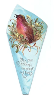 Christmas card in the shape of a robin in wrapping paper Christmas card in the shape of a robin in wrapping paper