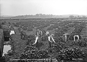 Clamping Turf in a Fermanagh Peat Bog Clamping Turf in a Fermanagh Peat Bog