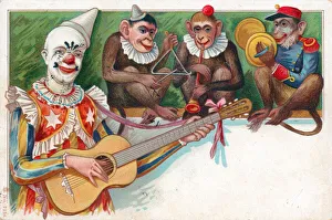 Clown with three monkeys on a postcard Clown with three monkeys on a postcard