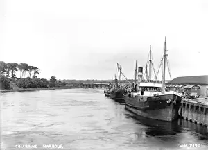 Prints of Coleraine Harbour - a view of three boats at the jetty. (Location: Northern Ireland; County Londonderry; Coleraine). Date: circa early 1900s Coleraine Prints: Coleraine Harbour Print - Early 20th Century View