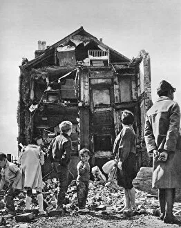 Slums Collection: Collapsed house in Swedenborg Square, Stepney