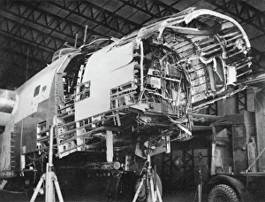<b class=qtipBold><figcaption>Consolidated B-24 Liberator</figcaption></b><br>Crash Damaged Consolidated B-24 Liberator During Rebuild / Repairs and Modifictions at Scottish Aviation at Prestwick, Scotland UK Date: 1940s<br><em>© aviation-images.com / Mary Evans Picture Library</em> Consolidated B-24 Liberator