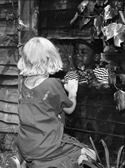Conversation through the garden fence, London England Conversation through the garden fence, London England