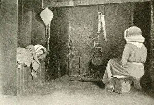 Cottage interior with mother and sleeping child, Devon Cottage interior with mother and sleeping child, Devon