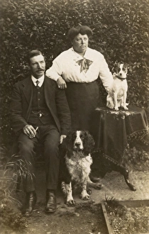 Couple with Jack Russell and Cocker Spaniel Couple with Jack Russell and Cocker Spaniel