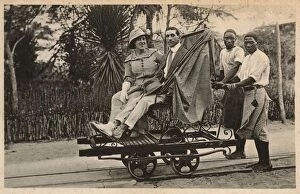 Beira Gallery: Couple riding trolley, Beira, Mozambique, East Africa