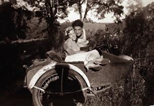 Couple together with1948 Harley Davidson motorcycle sidecar Couple together with1948 Harley Davidson motorcycle sidecar