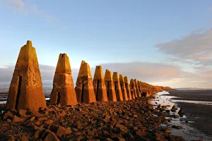 Cramond Island Causeway sea defence pylons at low tide Cramond Island Causeway sea defence pylons at low tide