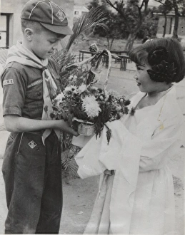 Cub Scout receiving flowers, Taipei, Formosa Cub Scout receiving flowers, Taipei, Formosa