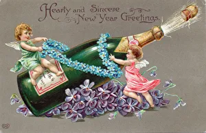 Cupids with a bottle of champagne on a New Year postcard Cupids with a bottle of champagne on a New Year postcard