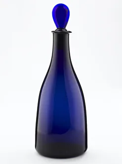 <b class=qtipBold><figcaption>Decanter</figcaption></b><br>Decanter of tapered form made from blown and bevelled blue glass, with a later pear-shaped stopper, one of a pair made in England c.1790. Date: c.1790<br><em>© The Geffrye Museum of the Home / Mary Evans Picture Library</em> Decanter