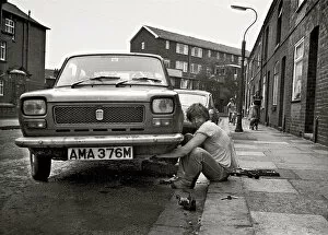 Repairing Collection: DIY mechanic fixing car, Eccles, Manchester
