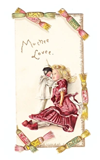 Doll and pierrot on a Christmas card Doll and pierrot on a Christmas card