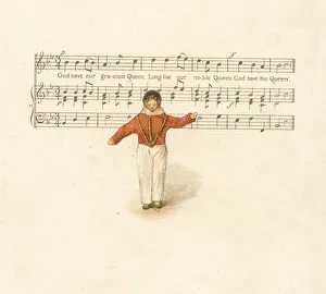 Doll representing a young man in front of a music score Doll representing a young man in front of a music score