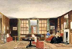 A drawing room with two seated women A drawing room with two seated women