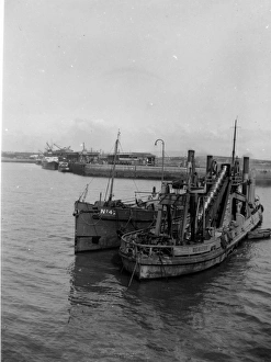 Dredger in Milford Haven Harbour, Pembrokeshire, South Wales Dredger in Milford Haven Harbour, Pembrokeshire, South Wales