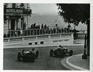 Two drivers on the Monaco Grand Prix circuit Two drivers on the Monaco Grand Prix circuit