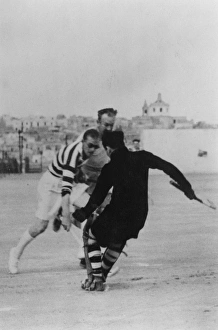 The Duke of Edinburgh plays hockey for HMS Chequers The Duke of Edinburgh plays hockey for HMS Chequers