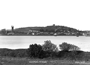 Prints of Dundrum, Co. Down - a panoramic view of the town from across the bay. (Location: Northern Ireland: County Down: Dundrum). Date: circa early 1900s Down Prints: Panoramic View of Dundrum, Co. Down Print circa early 1900s