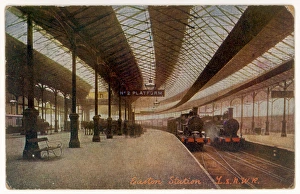 <b class=qtipBold><figcaption>Euston Platform & Trains</figcaption></b><br>Two trains of the London and North Western Railway await their passengers.<br><em>© Mary Evans Picture Library</em> Euston Platform & Trains