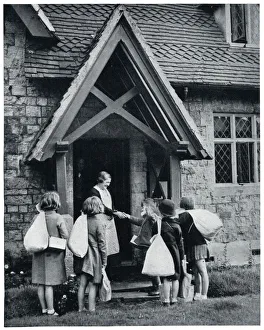 Evacuees receive their kit bags in the country 1939 Evacuees receive their kit bags in the country 1939