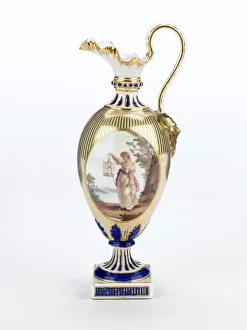 <b class=qtipBold><figcaption>Ewer</figcaption></b><br>Ewer made from porcelain, painted in gold and blue on a white ground with a coloured central reserve depicting a shepherdess holding a bird cage. The ewer is part of a <i>garniture de chemin饦lt;/i> manufactured by Derby Porcelain Works c.1782. Date: c.1782<br><em>© The Geffrye Museum of the Home / Mary Evans Picture Library</em> Ewer